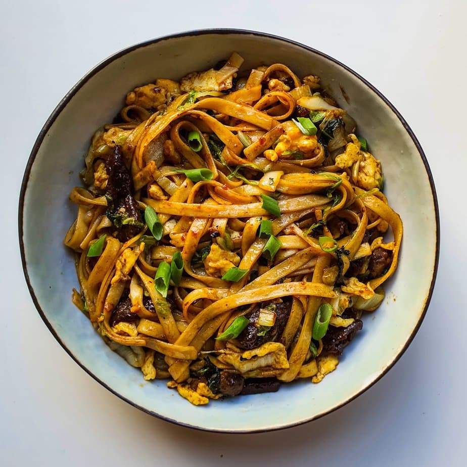 streetfood-style rice noodles on white background