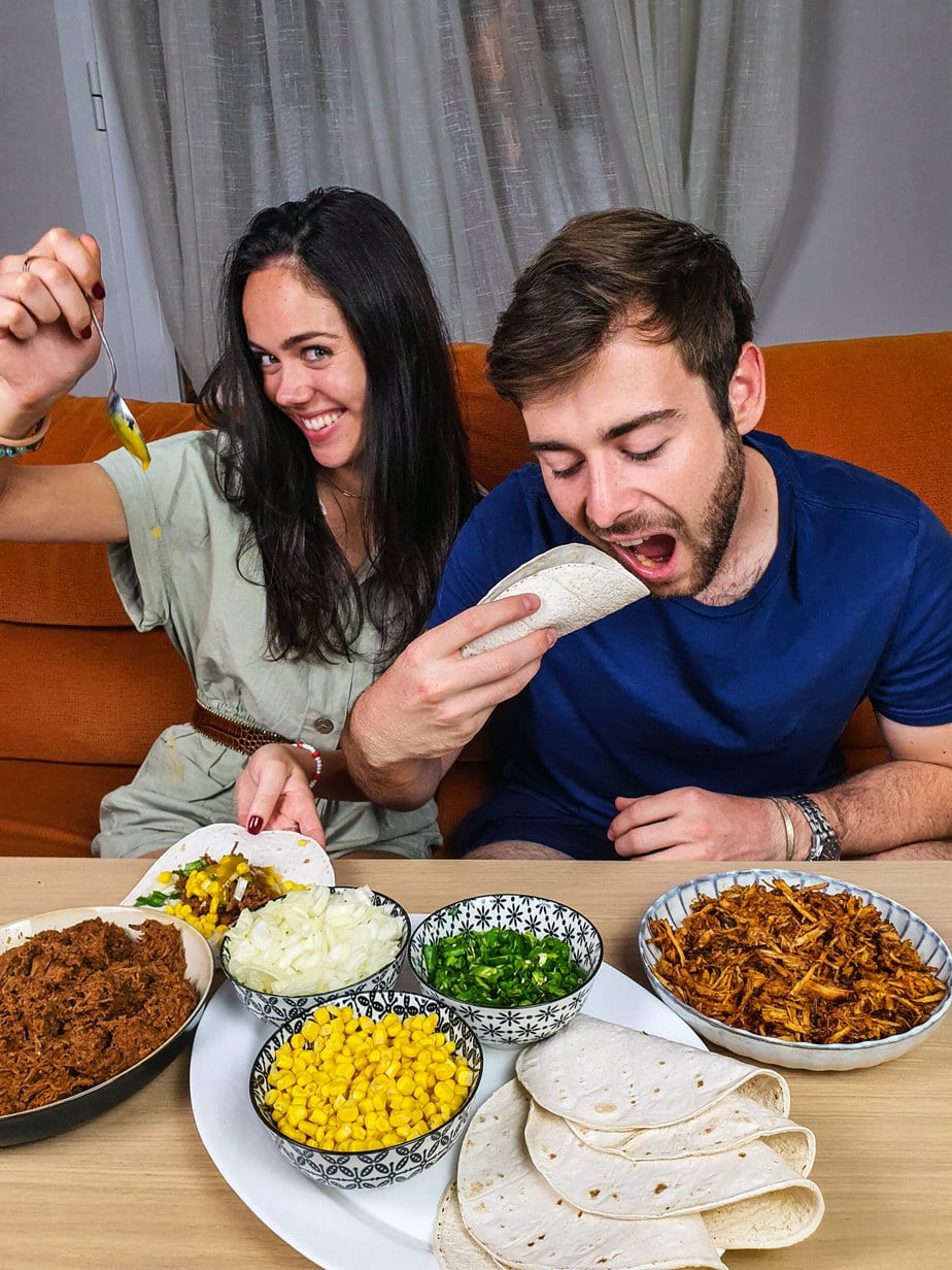 Couple eating beef tacos 