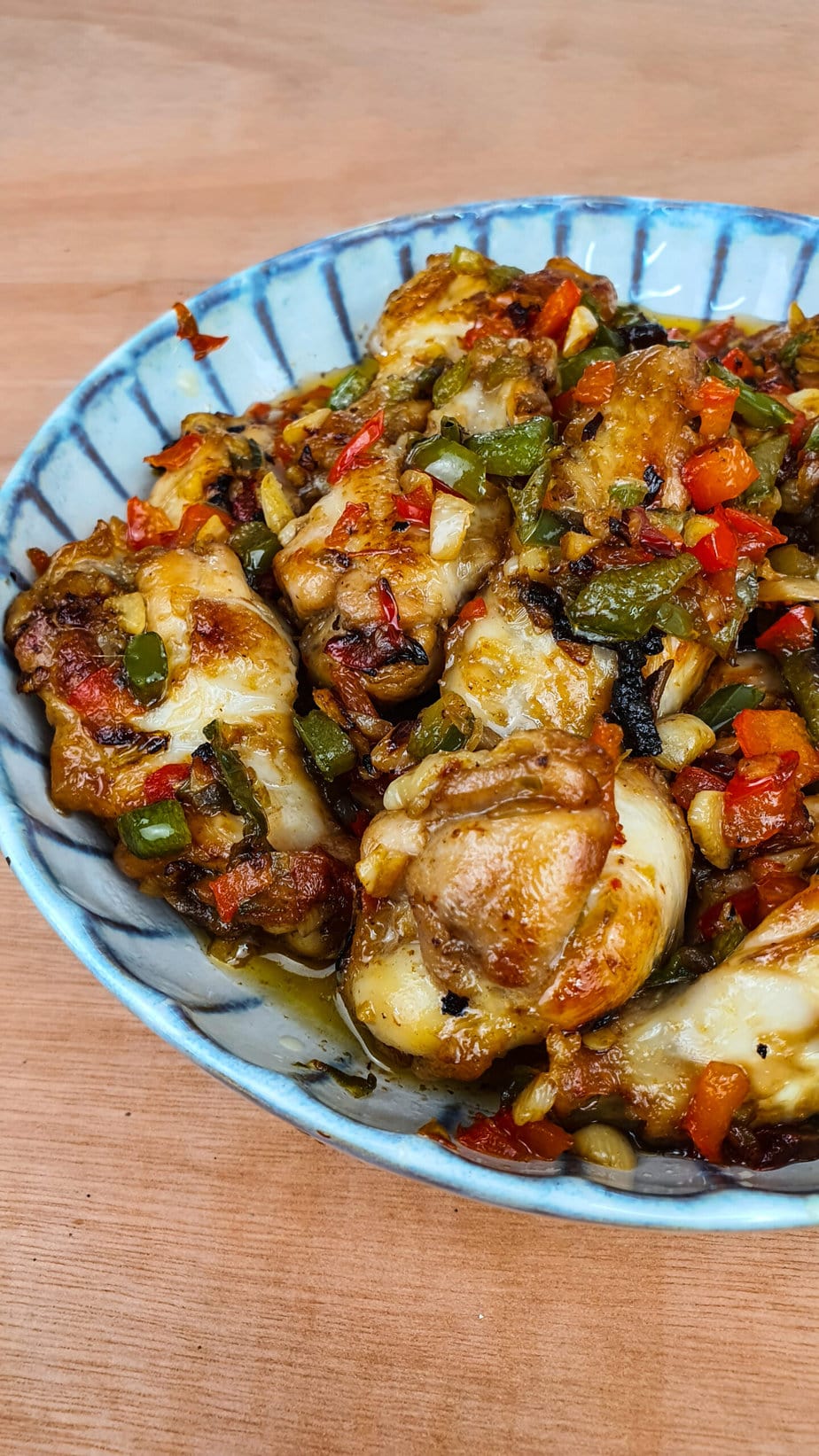 close-up of garlic and bell pepper wings