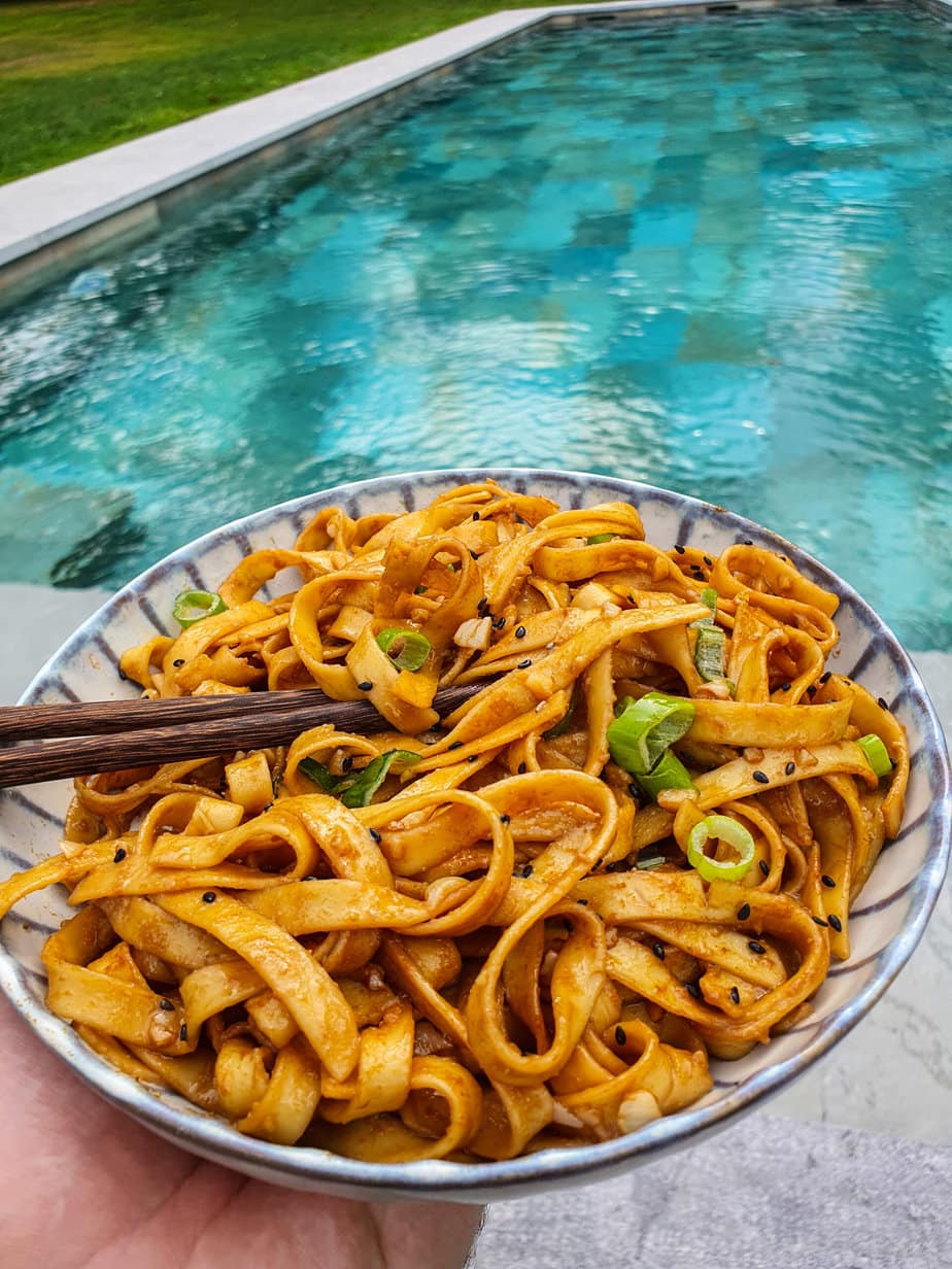miso noodles with pool background