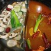 bouillons pour fondue chinoises dans wok ying yang