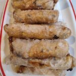 nems sur assiette blanche
