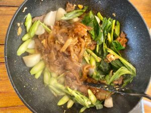kai lan dans wok