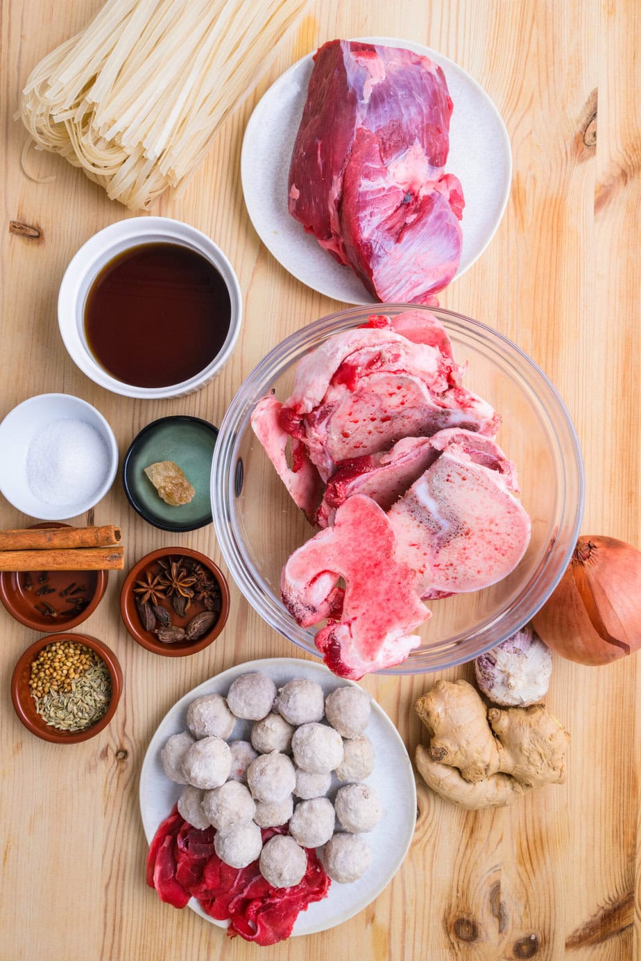 ingredients for Vietnamese pho on a wood background