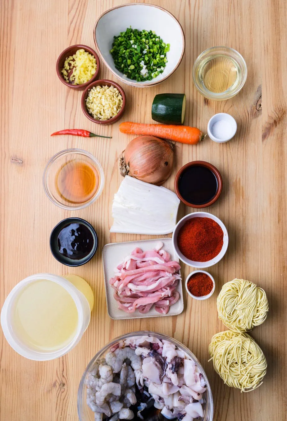 Ingredients for Homemade Jjamppong on a Wooden Background