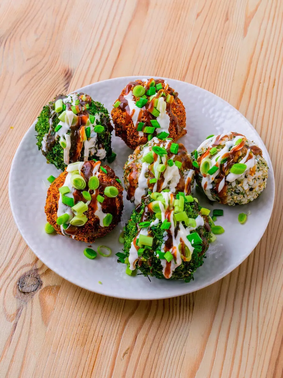 jumeokbap on a plate on a wooden background