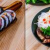 Assiette de kimbap coréen à gauche et bol de vermicelles avec viande grillée à droite sur une table en bois.