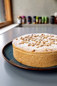 Flan sans gluten aux agrumes - Laisse la tarte refroidir complètement avant de saupoudrer de sucre glace.