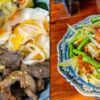 Deux assiettes asiatiques : bœuf grillé avec nems et vermicelles, et salade de papaye verte avec légumes croquants.