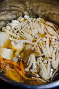 Tōnyū nabe - Porter de nouveau à ébullition.